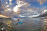 Surfer on a Tahe outdoors surfboard